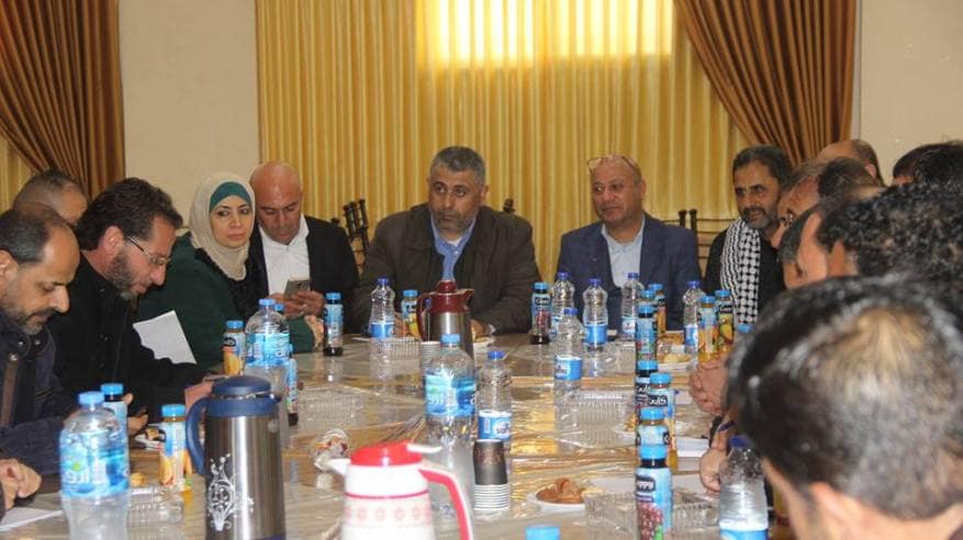 خلال لقاء أبو هولي مع رؤساء وأعضاء اللجان الشعبية